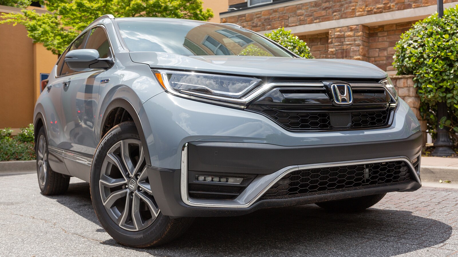 2021 Honda CR-V Hybrid front right side in Obsidian Blue Pearl